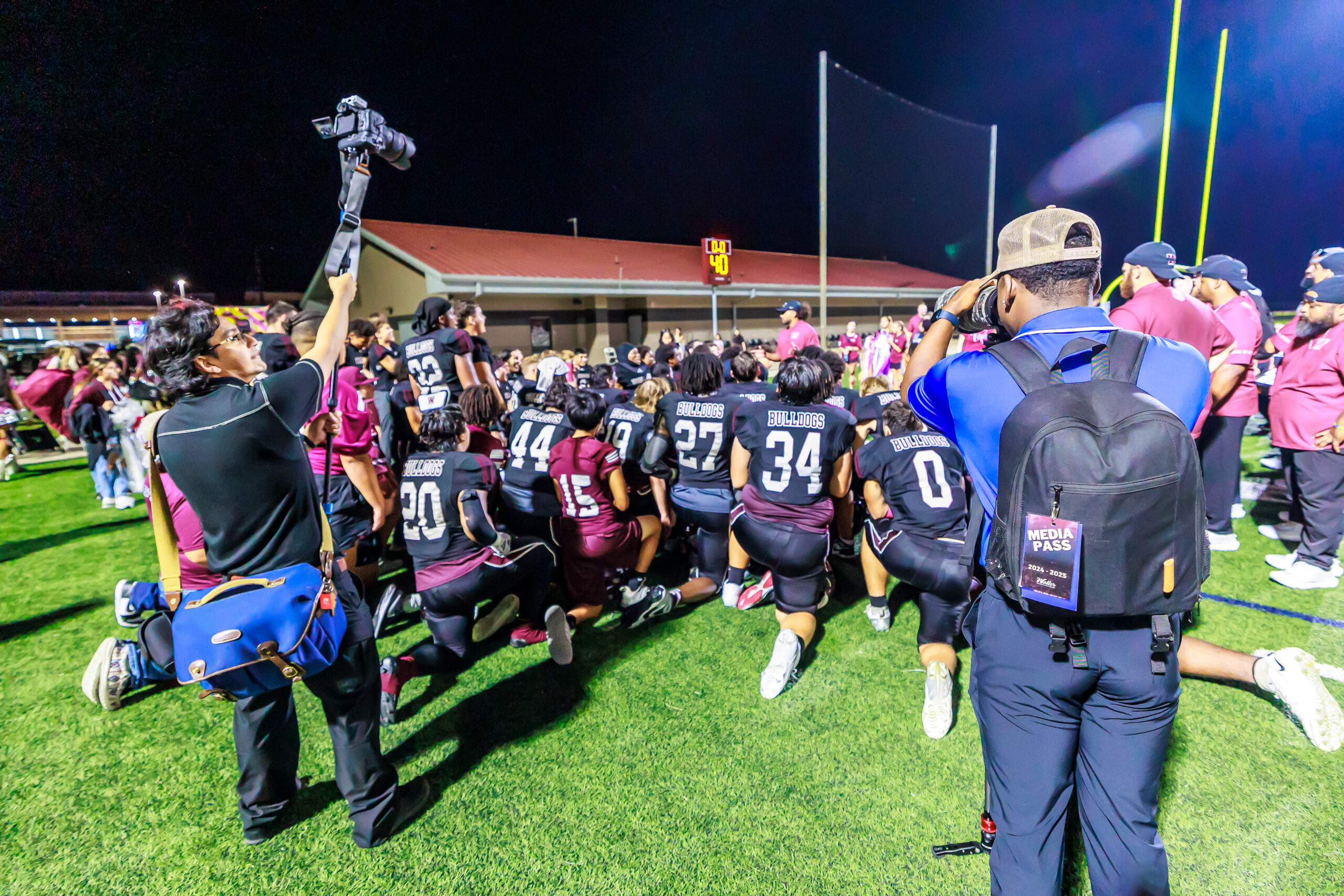 Part of the Ronin Visuals team capturing still photography and audio / video of a team's post-victory traditions.