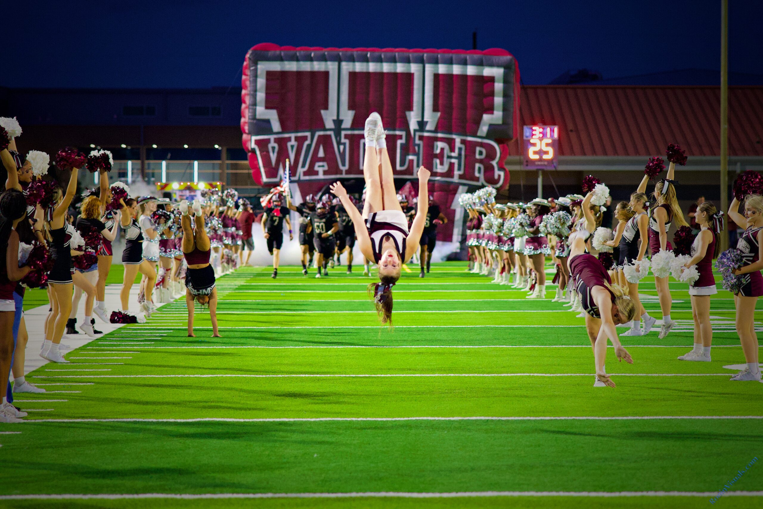 An epic cheer run through flip before a football game in Waller Texas.